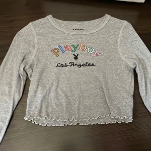 The brand is playboy sold at pacsun gray color bright colors for the summer